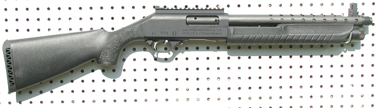 Heckler & Koch FABARM FP6 Entry Tactical short-barreled 12 ga. shotgun (Class III) manufactured by FABARM and marketed by Heckler & Koch 14" barrel, 33.75" overall length